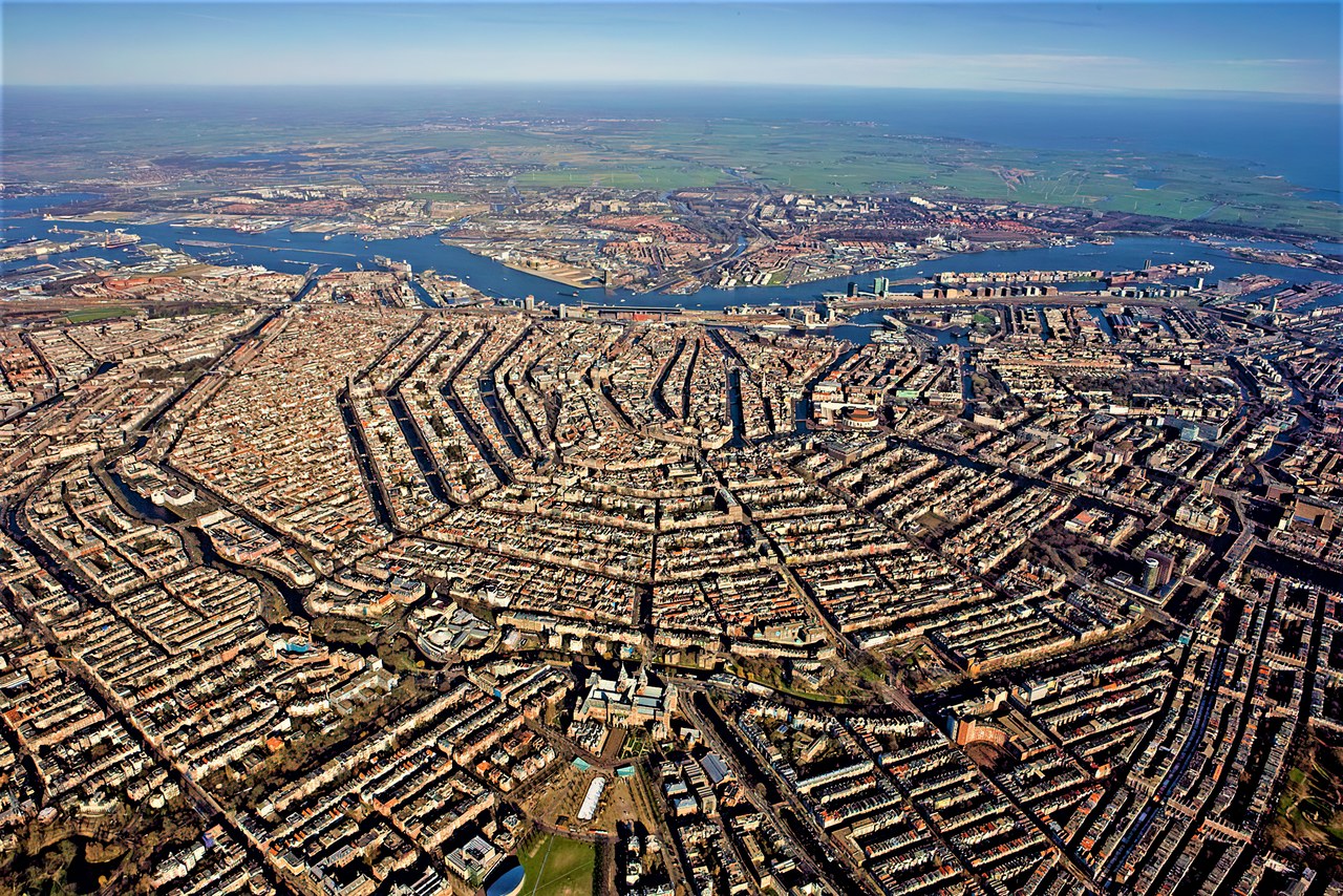 An aerial view of Amsterdam and its concentric canals